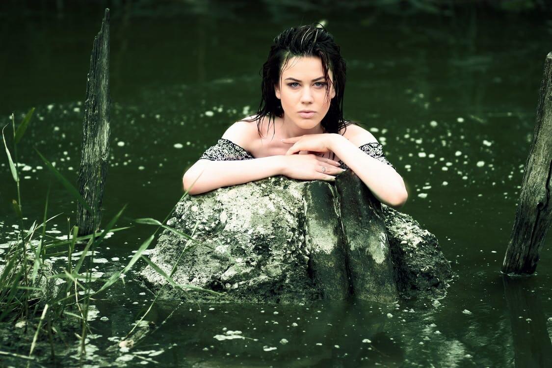 girl-water-wild-vegetation-160641